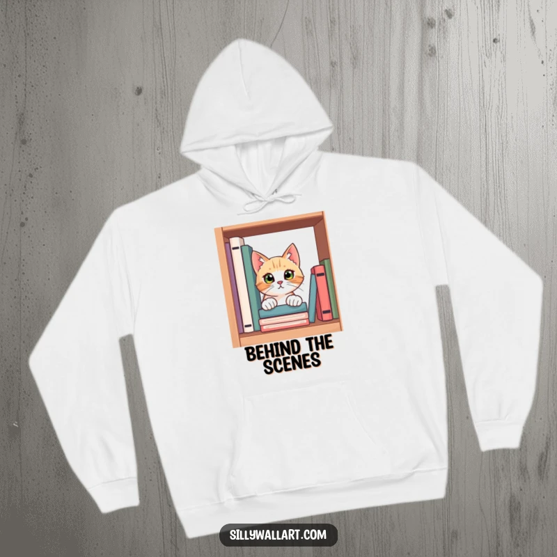 Funny hoodie depicting a curious cat peeking its head out from behind a shelf full of books, embodying a sense of wonder.