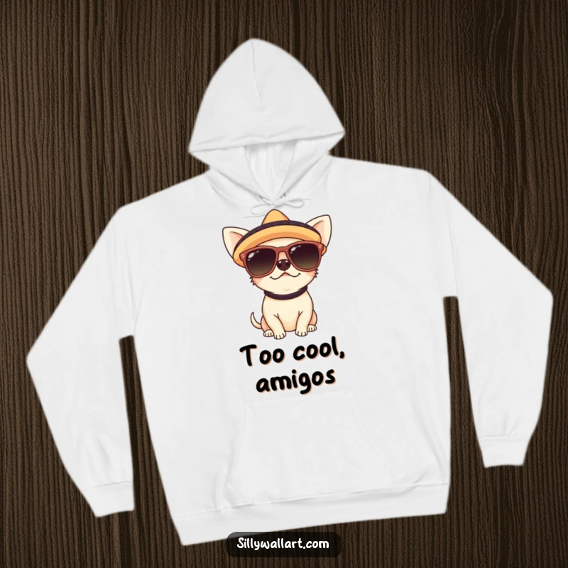 Funny hoodie featuring a cute chihuahua in oversized sunglasses and a sombrero, offering warmth and festive, humorous charm.