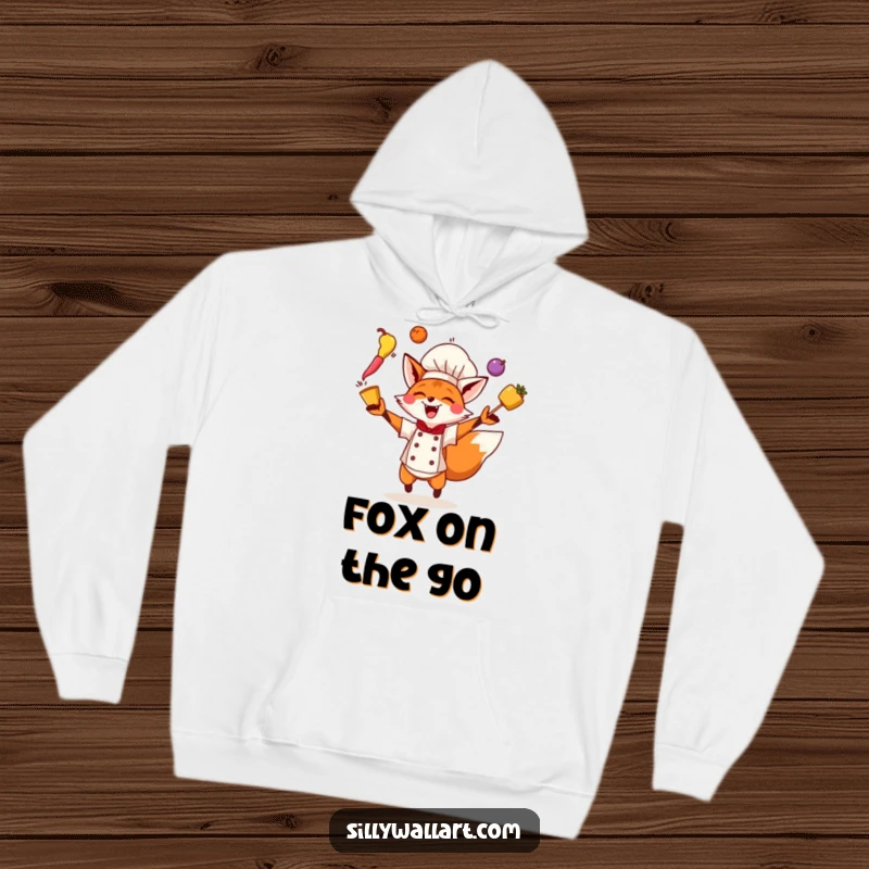 Funny Fox Chef Hoodie featuring an energetic fox juggling ingredients, perfect for staying warm during kitchen adventures.