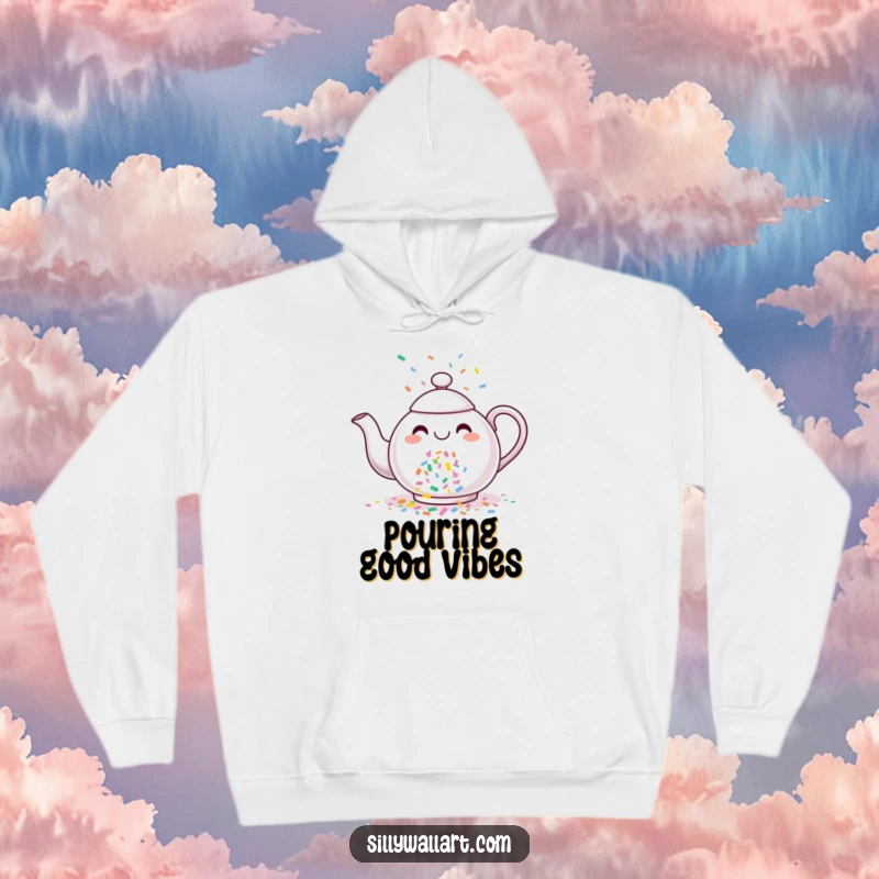 Funny hoodie depicting a happy teapot generously showering colorful confetti, perfect for cozy and cheerful occasions.
