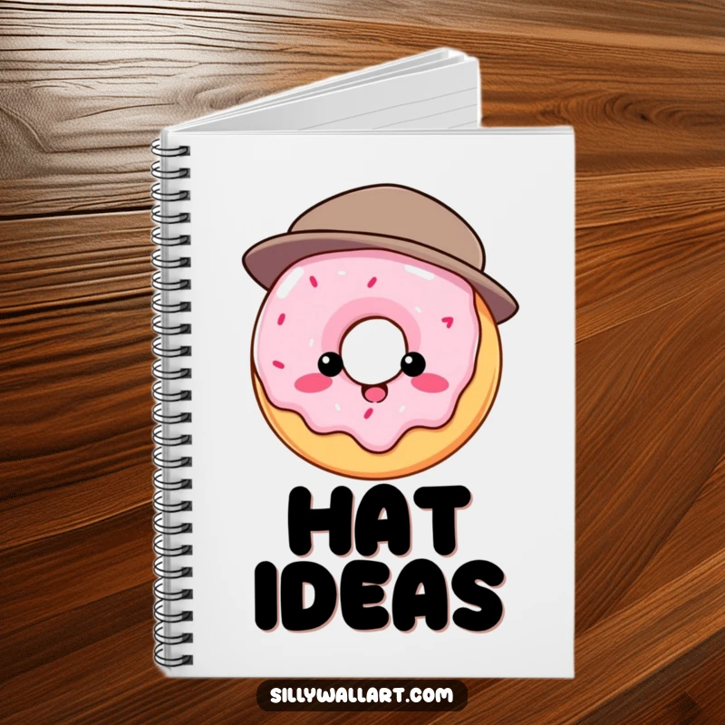 Funny notebook: Round donut comically struggling to wear a tiny hat, ideal for journaling and silly notes.