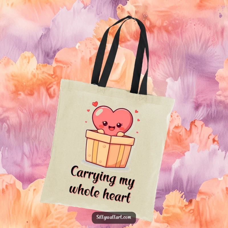 Funny tote bag: A smiling heart character popping out of a gift box, a cheerful and practical accessory.