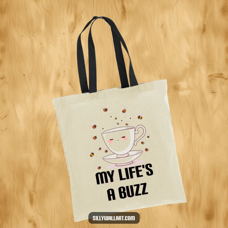 Funny teacup character, flustered, juggling a swarm of bees, on a practical tote bag for humorous carry-alls.
