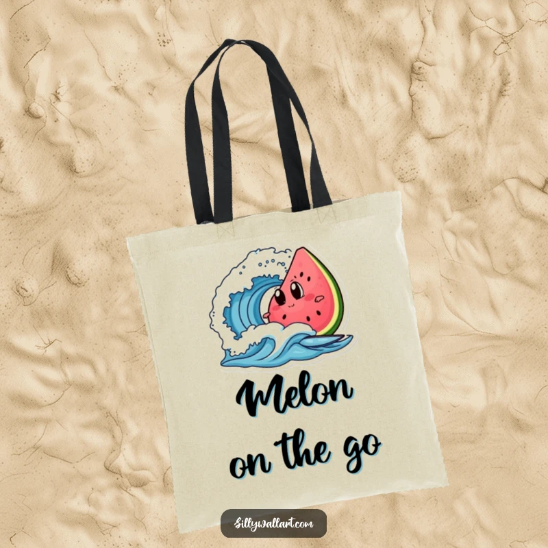 Funny watermelon slice with googly eyes, surfing a wave, on a practical tote bag for humorous beach carry-alls.